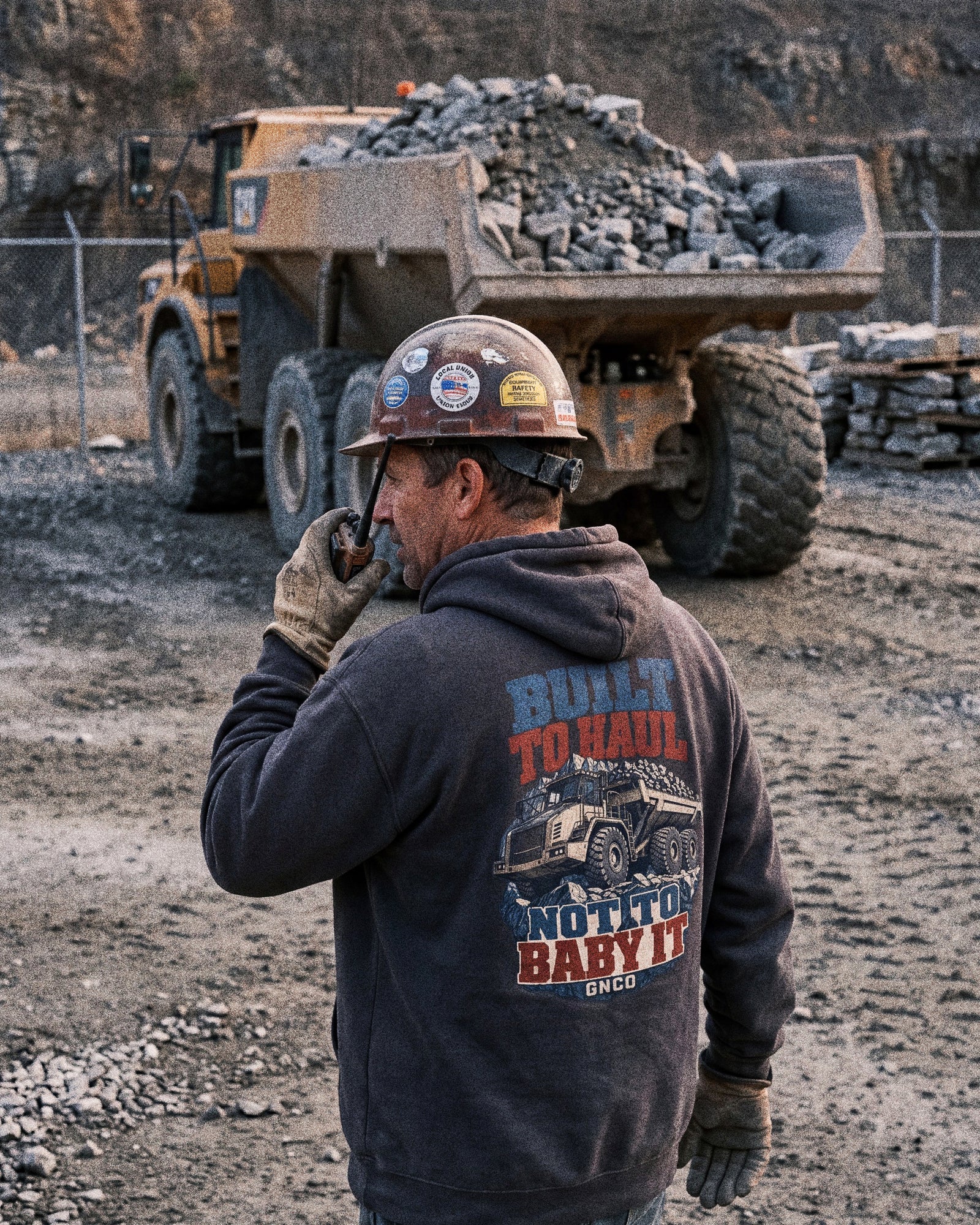 Built To Haul quarry haul truck hoodie worn by an operator at work