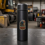 BLUE COLLAR COWBOY 3-inch vinyl sticker on a black industrial thermos