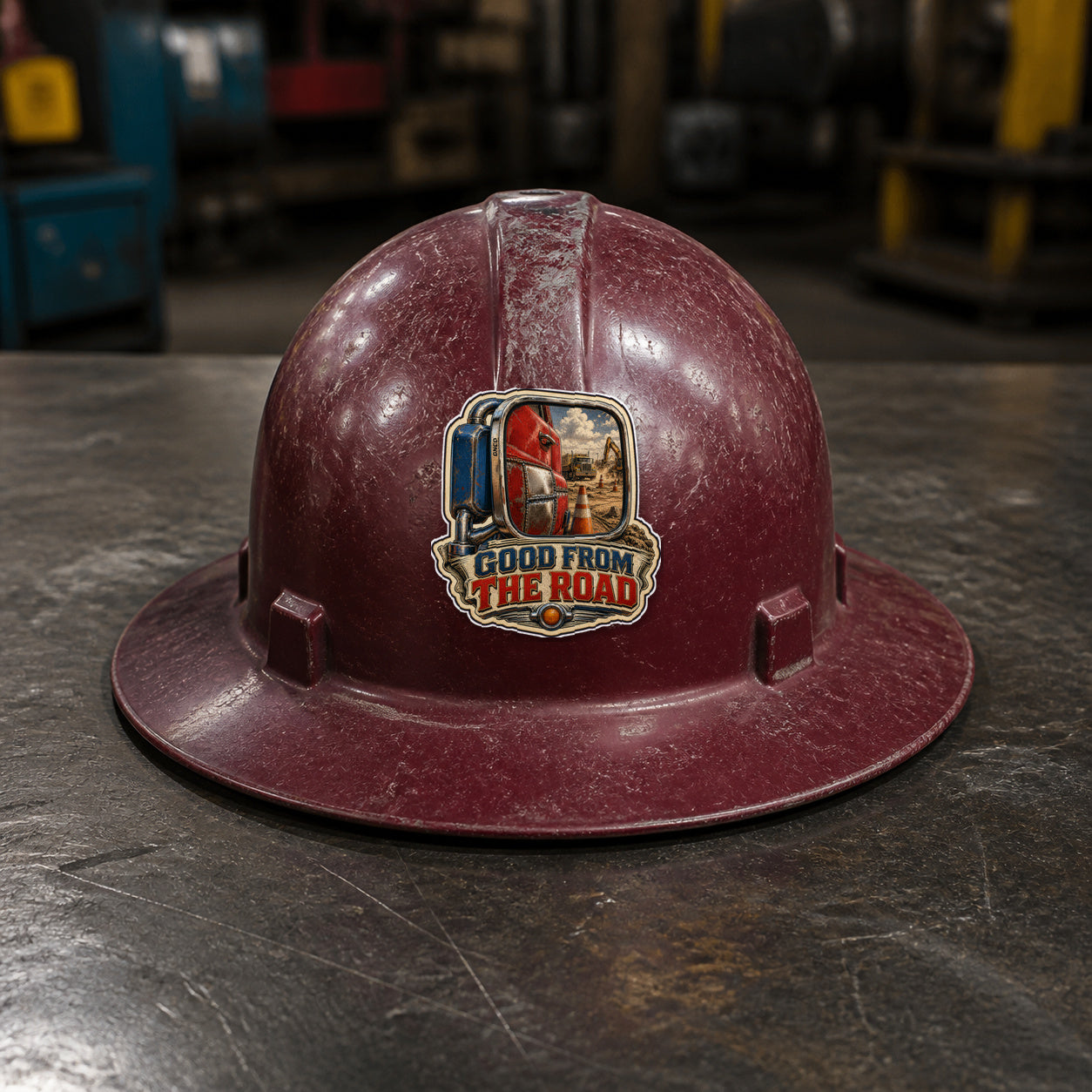 GOOD FROM THE ROAD 3-inch vinyl sticker on a worn maroon full-brim hard hat